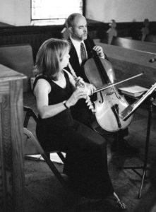 Flute and Cello Playing Music at Wedding